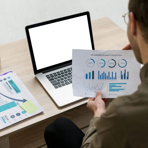 man-working-with-infographics-indoors AI-based-billing